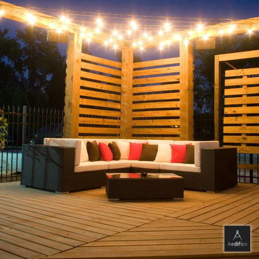 this lighted pergola on a dark Ottawa night is warm and attractive to prospective clients